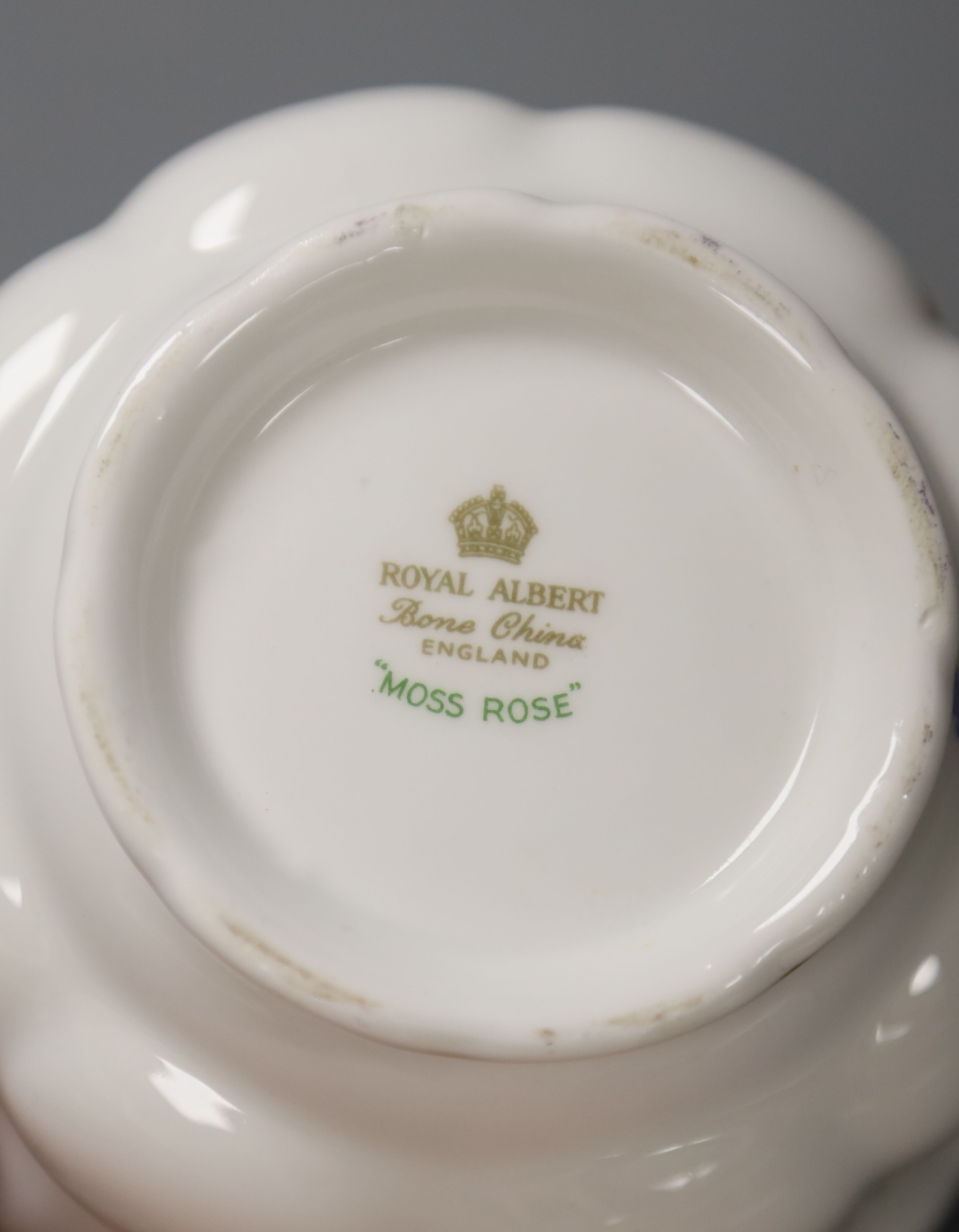 A Royal Albert Moss Rose pattern tea service (41-pce) and a set of four Coalport botanical cups and saucers